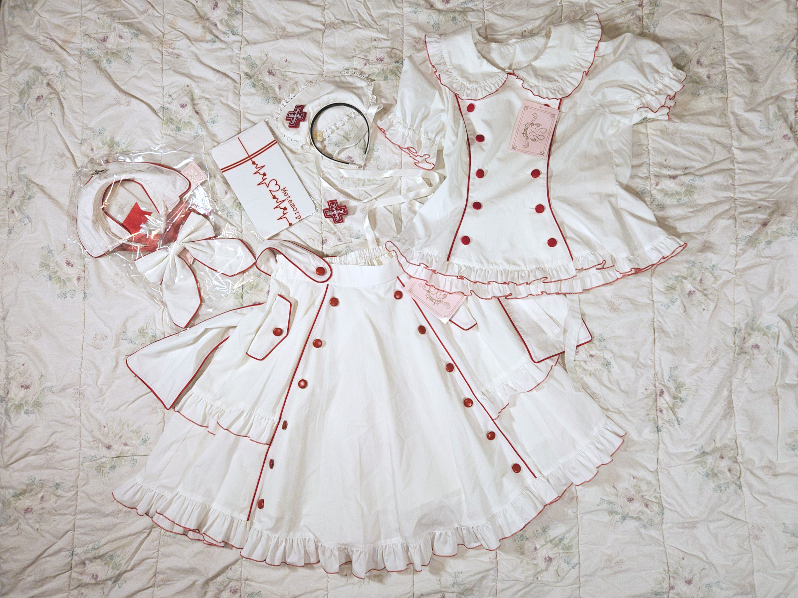 flatlay: little nurse blouse + skirt (2024) with hospitality doll accessories (2003)